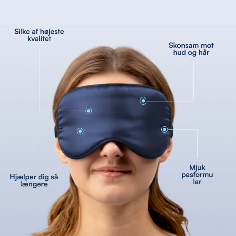 Kvinde med mørkeblå silkesovemaske, tæt portræt med fokus på blød, hud- og hårvenlig, formtilpasset komfort